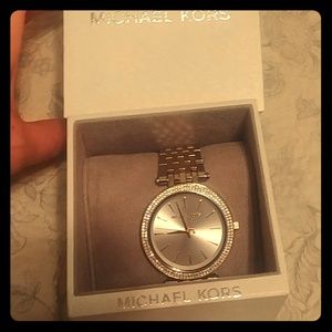 Michael Kors Silver and Gold woman's watch.